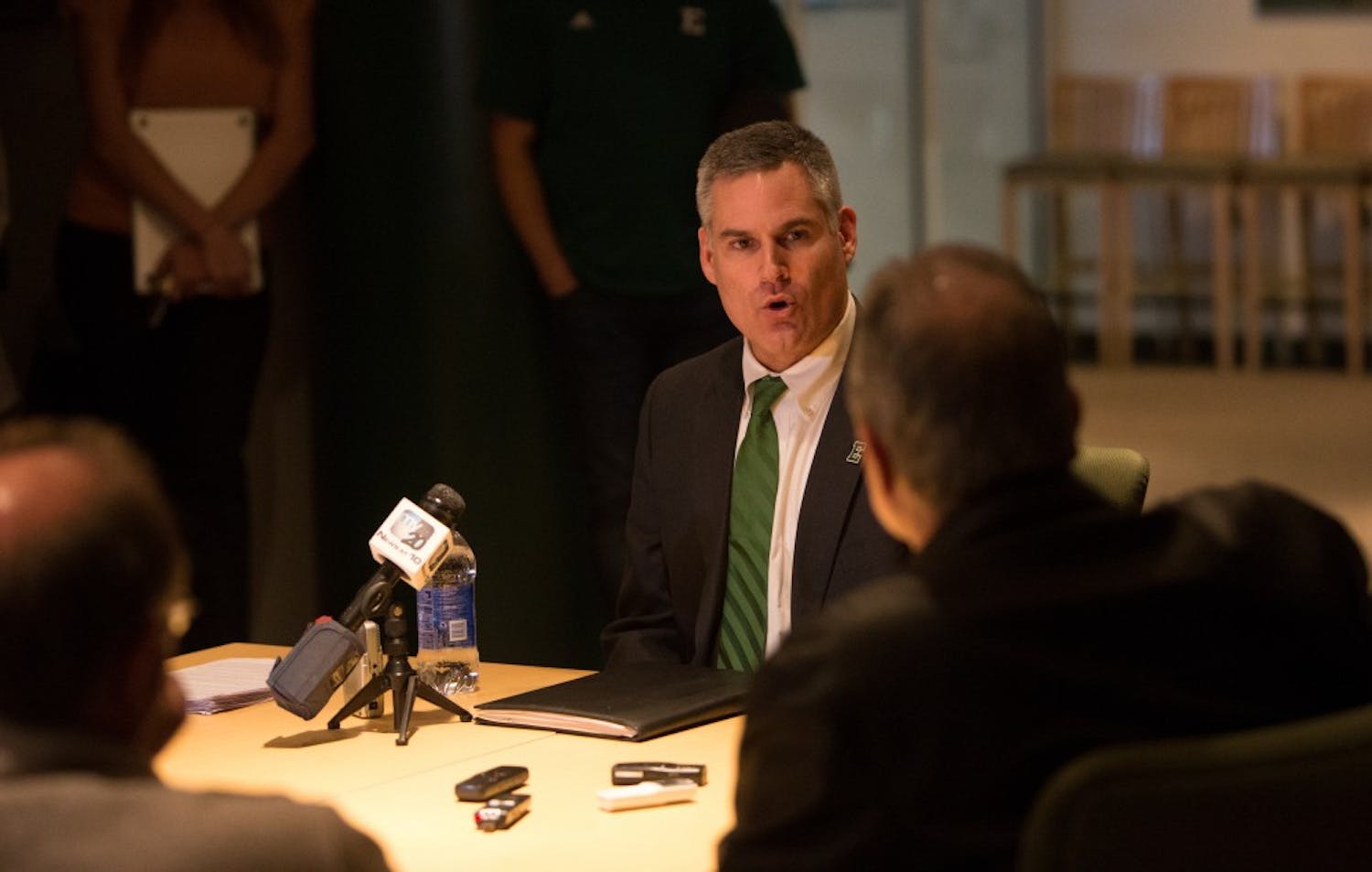 	New head football coach Chris Creighton speaks privately with the media after his press conference Thursday afternoon in the Convocation Center.