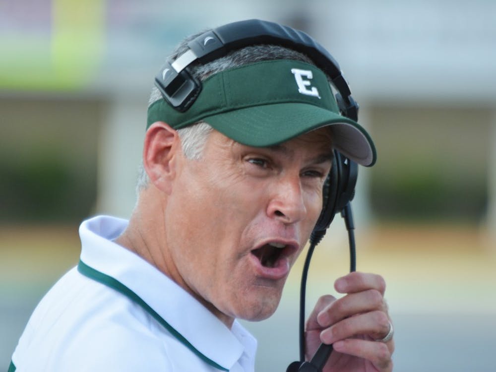 Coach Creighton disputes a referee call at the EMU vs. Morgan State football game on August 31, 2014 at Rynearson Stadium.