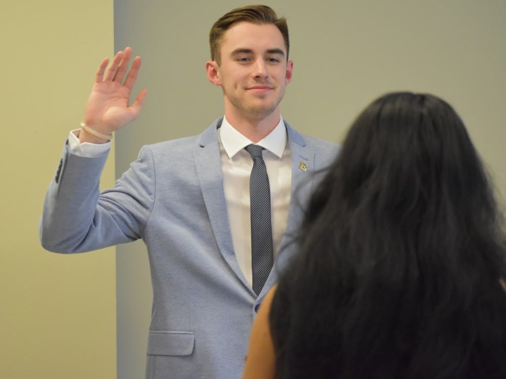 Taylor Lawrence is sworn in for his second term as Speaker of the Senate by Student Body President Candice Crutcher at the Senate’s organizational meeting on Tuesday, April 9th.