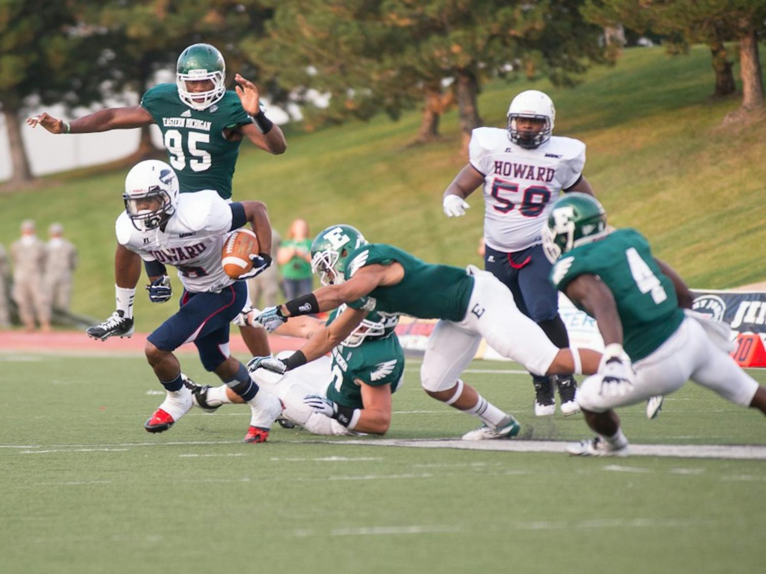 Howard reciever Jonathan Booker escapes a swarm of Eagles during the Bison's game a gainst Eastern Michigan on August 31 at Rynearson Stadium.