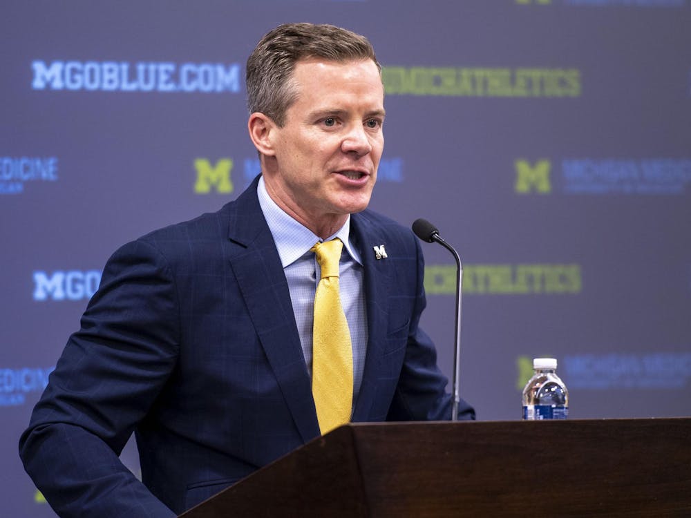 Dusty May addressing the media at his introductory press conference introducing him as the new University of Michigan men’s head basketball coach.