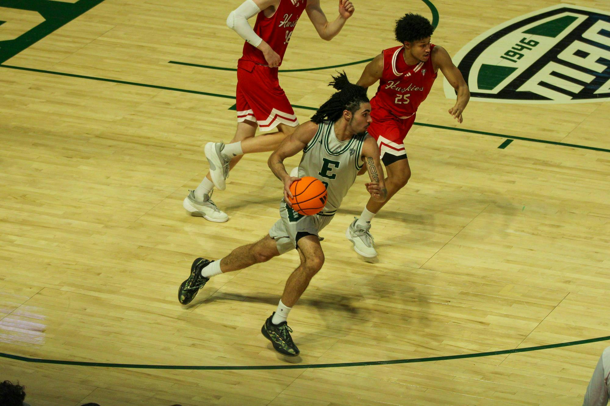 Eastern's #9 Patterson bringing the ball down the court. 
