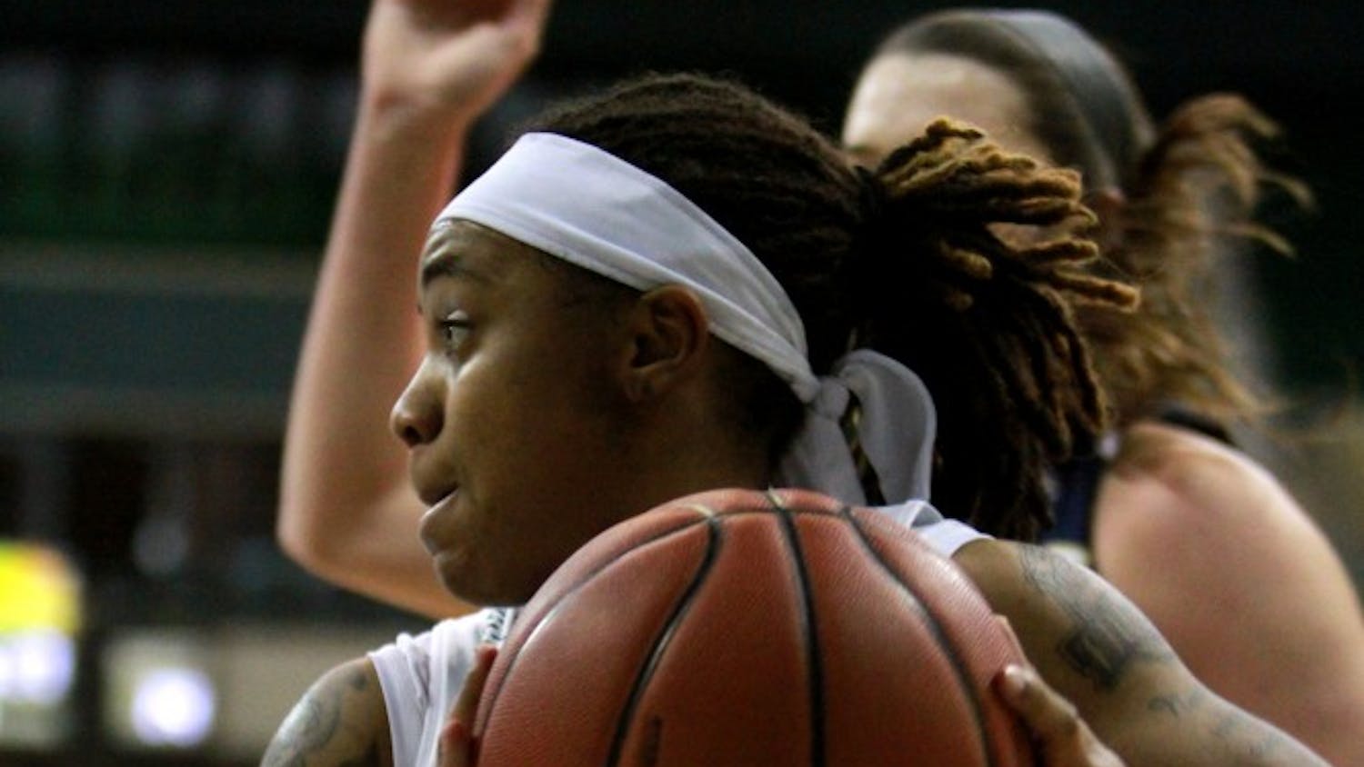 Cha Sweeney passes the ball during the game against Akron at the Convocation Center in Ypsilanti on Wednesday January 6, 2016.