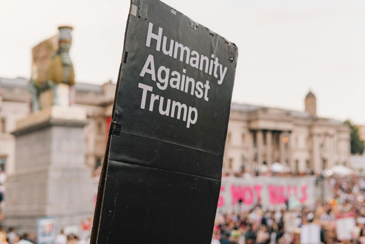 Humanity Against Trump protest sign