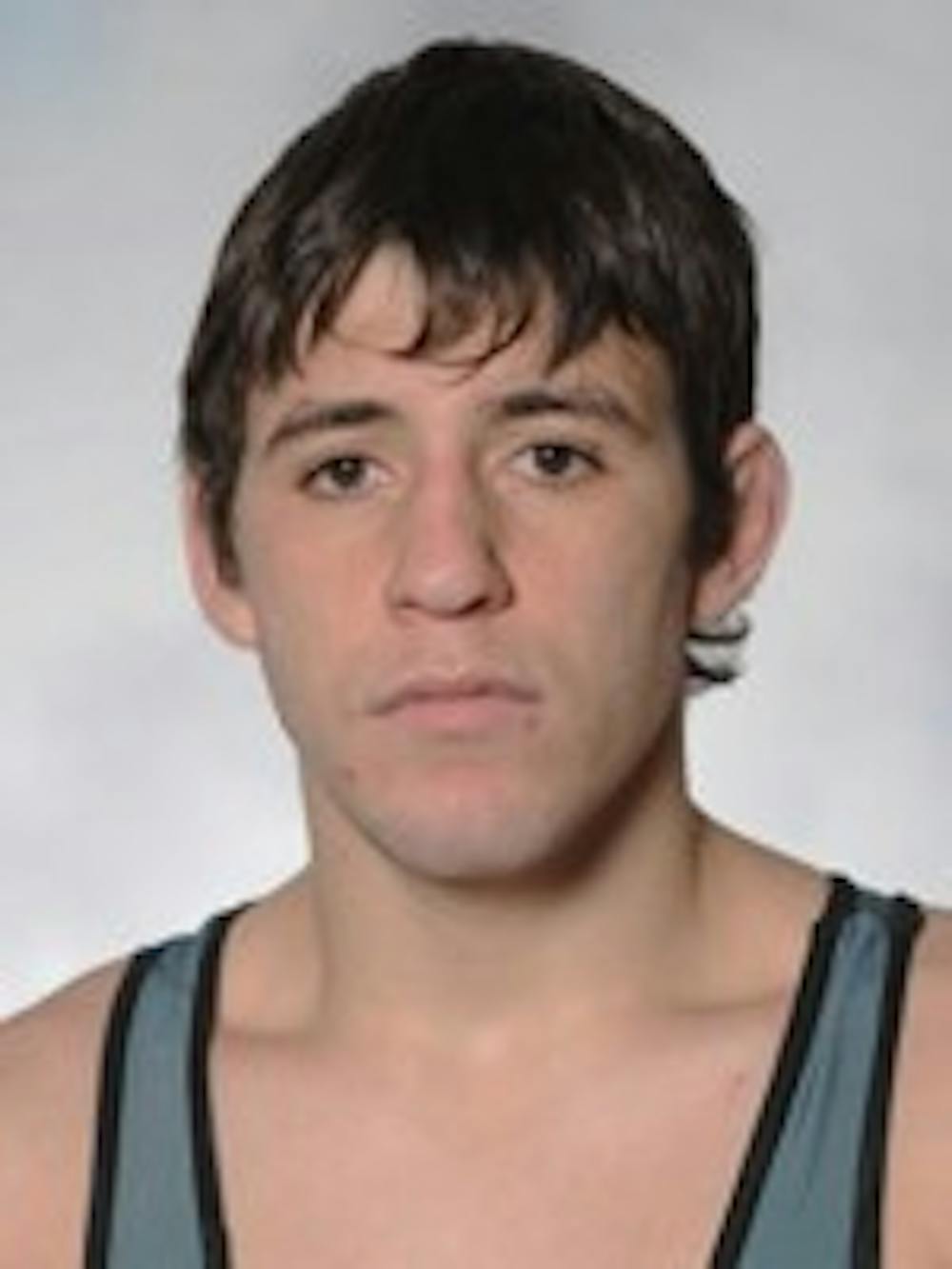 Two wrestlers get ready for NCAA championships