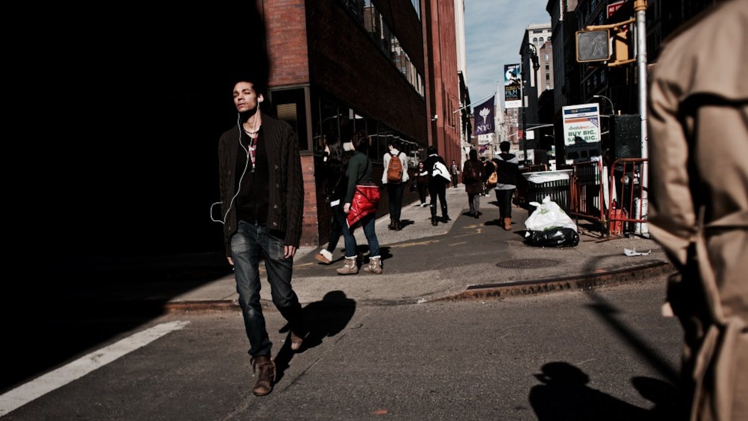 Man wearing headphones in the street