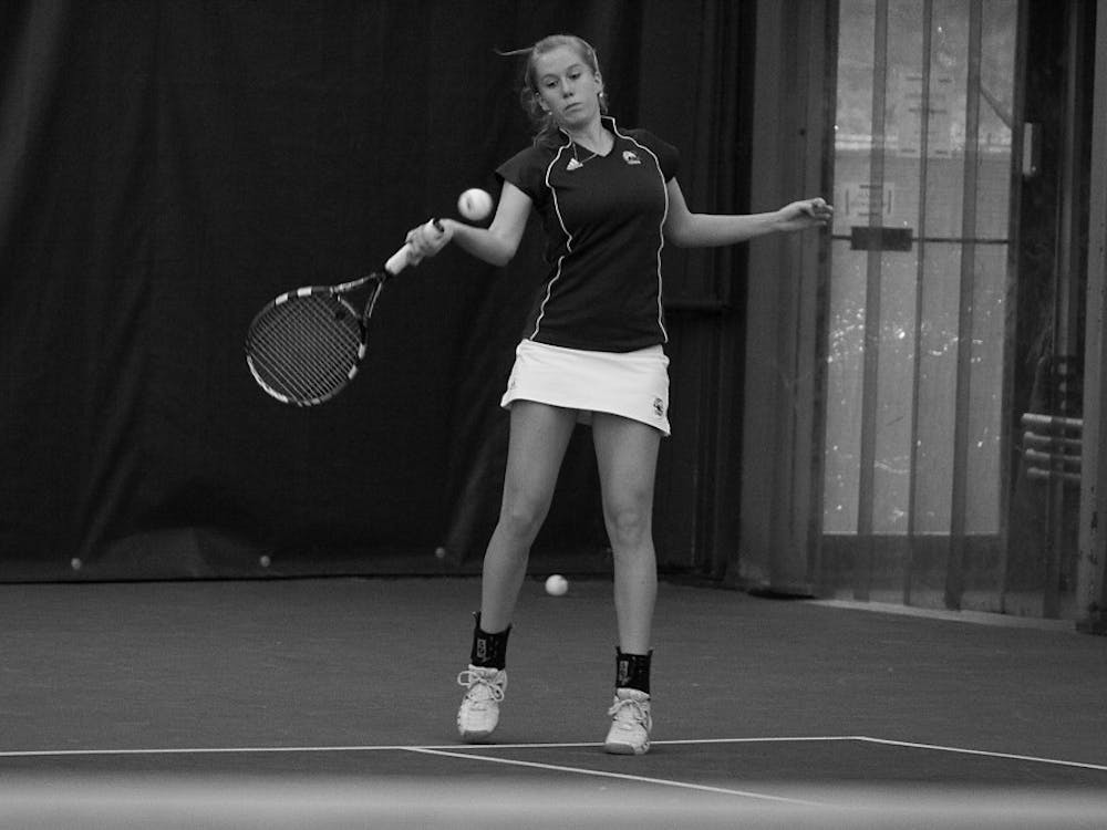 The Eagles’ singles players won six of the last seven games in the match Saturday. Sophomore Miram Westerink shown here in 2009, won over Rachel McGowan 6-2,6-2.