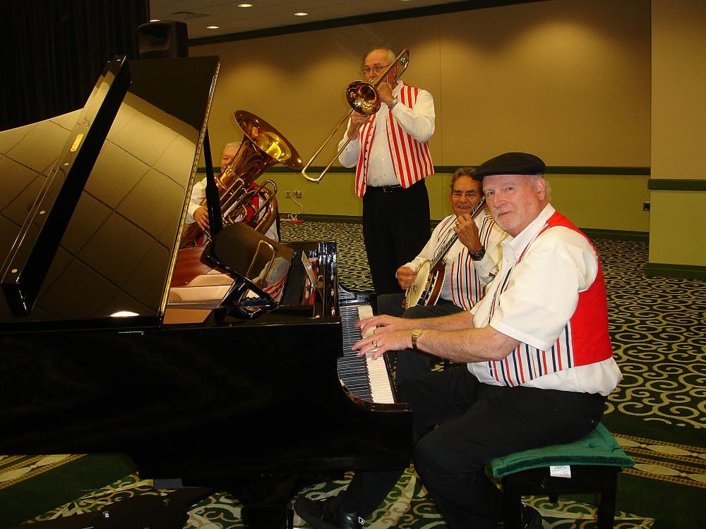 	Retired EMU music instructor R.J. Smith (tuba) performs with a band at last year’s German-American Day.