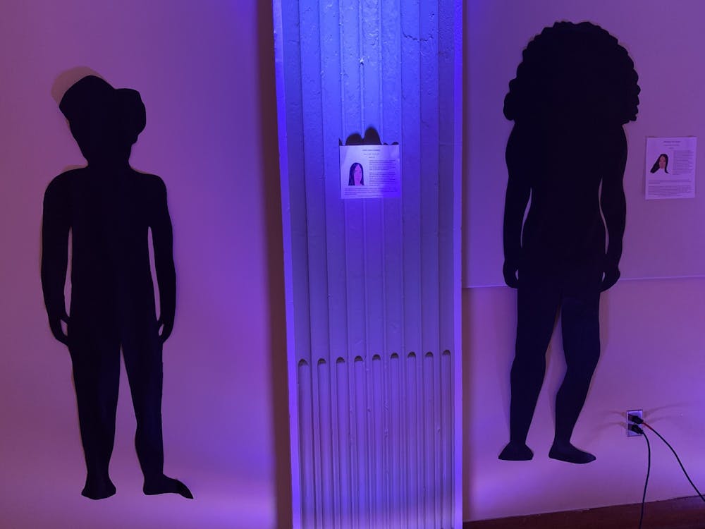 Each cut-out lining the walls represented a trans life lost in 2019