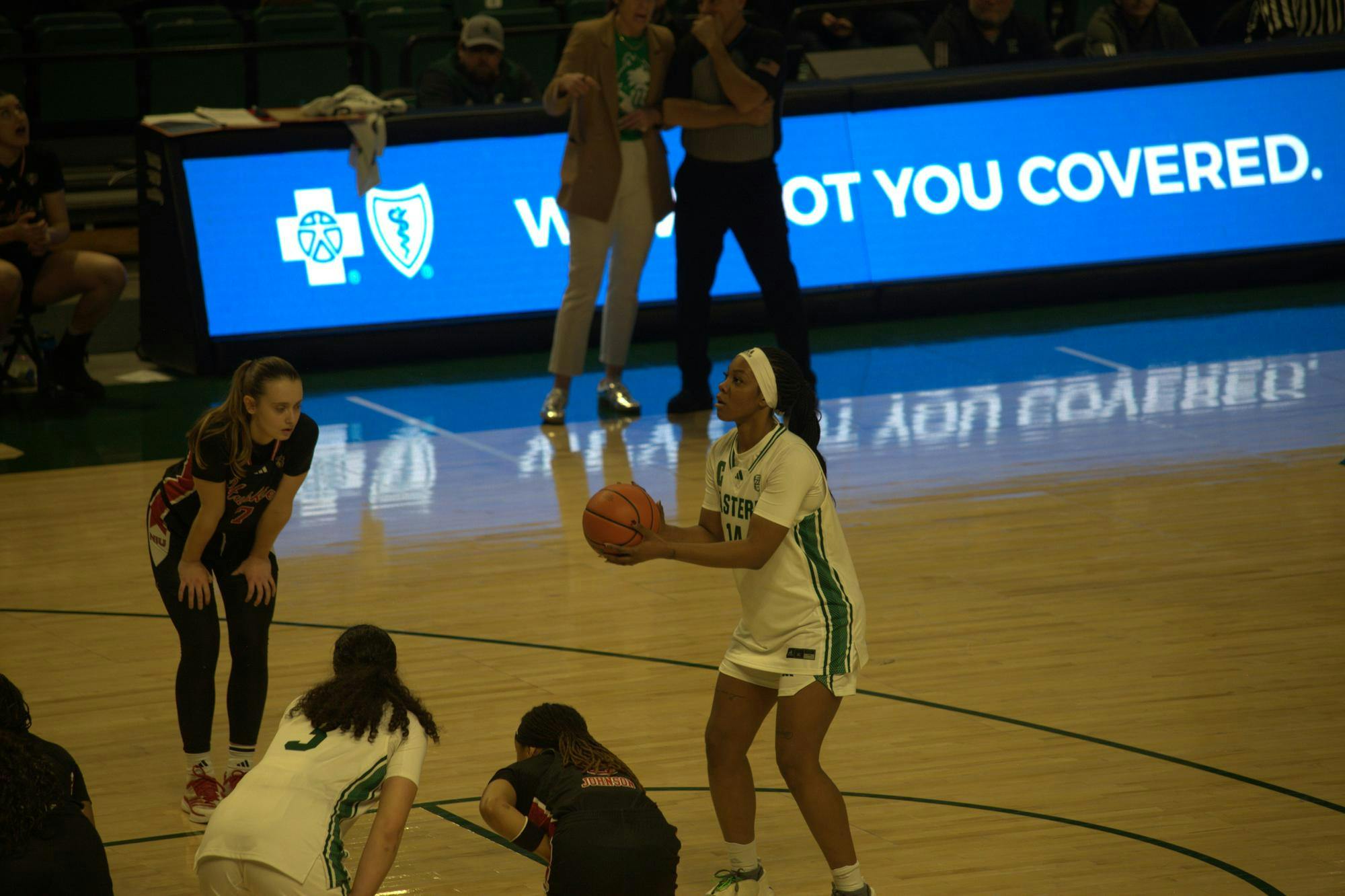 Eastern Michigan Women's Basketball player shoots free shot.
