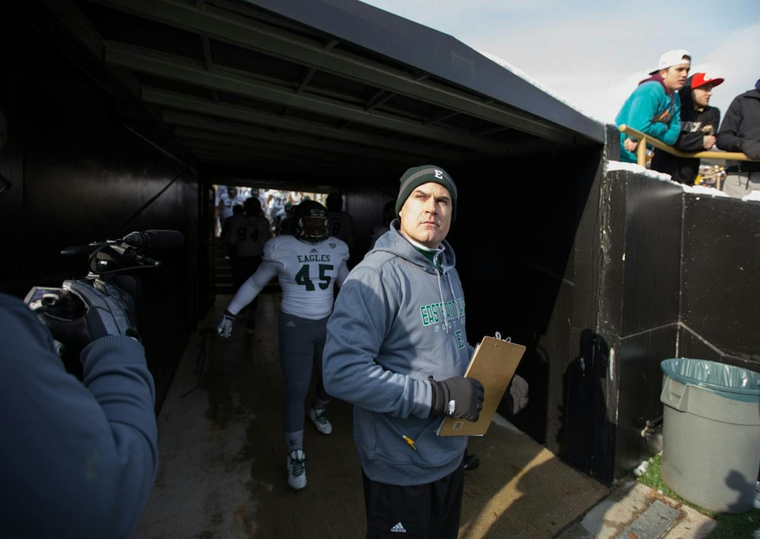 Eastern Michigan coach Chris Creighton prepares to lead his team onto the field in the Eagles 51-7 loss to Western Michigan Saturday afternoon in Kalamazoo.