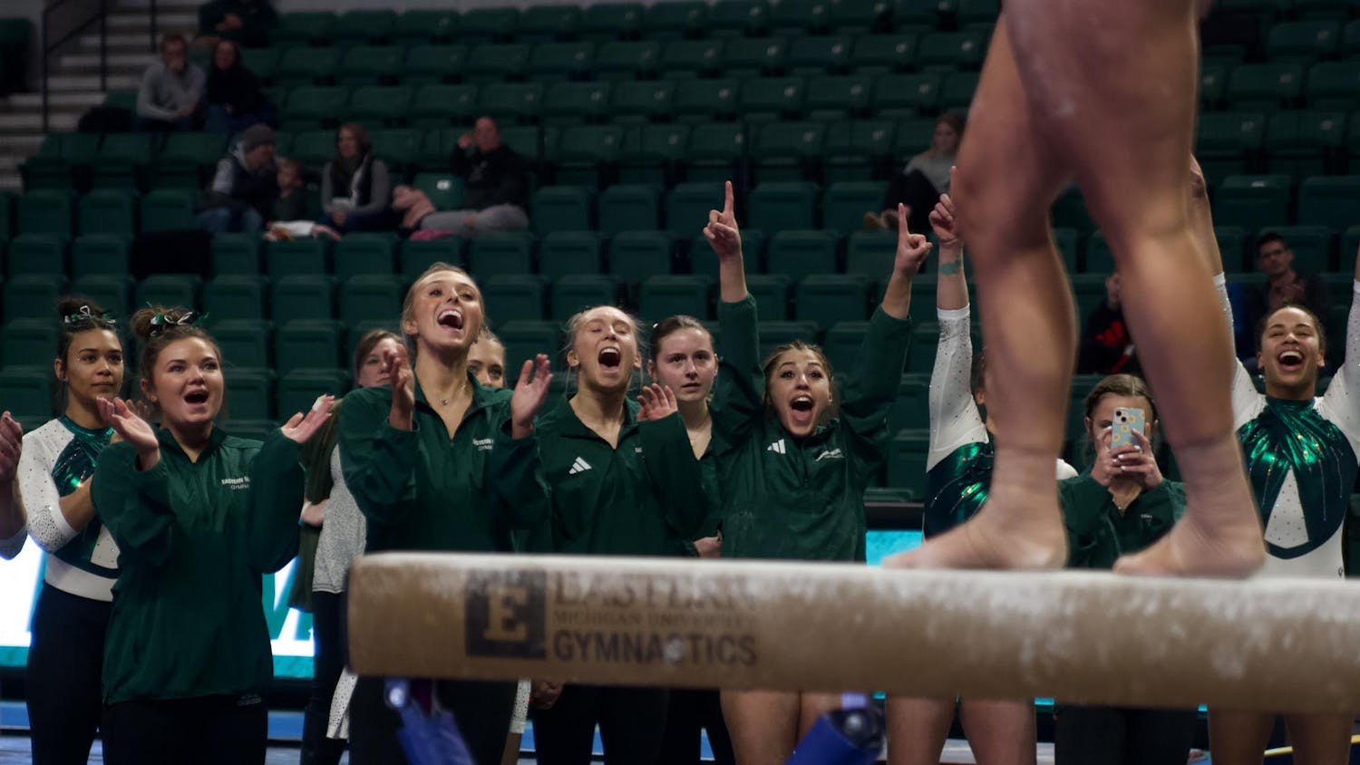 EMU vs NIU: EMU Team Cheering.jpeg