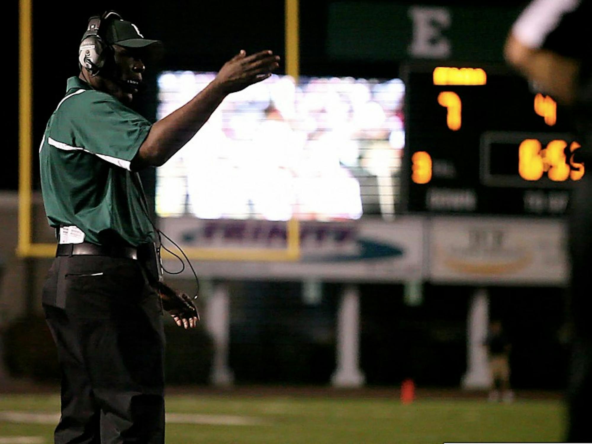 Ron English calls his team in during the fourth quarter of the EMU vs. Army game, September 5th, 2009.