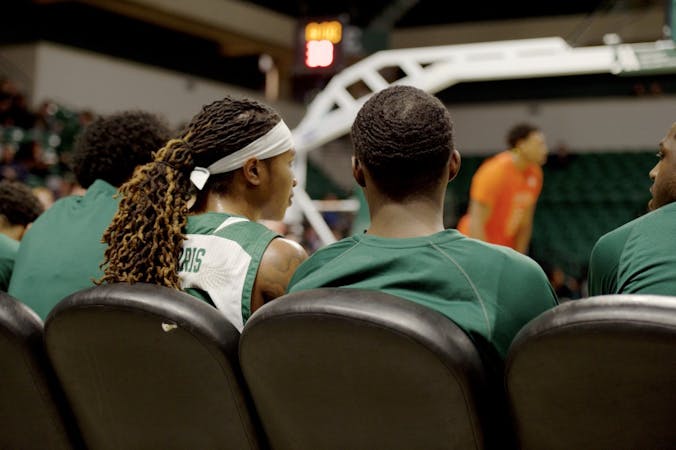 Damari Parris watches from the bench at the Convocation Center on Jan. 22.