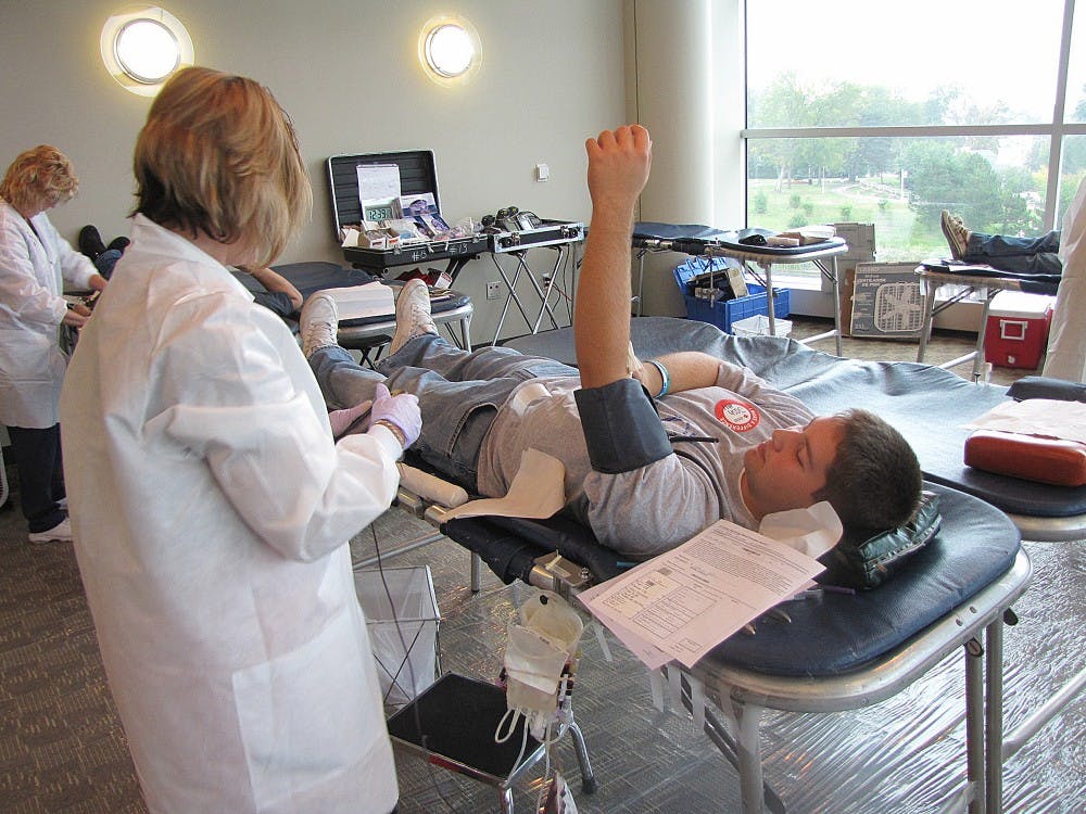 Sophomore Josh Blair saved three lives at the student center blood drive last Monday.