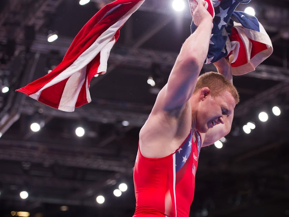 Jacob Varner of the United States celebrated his gold medal victory in a 1-0, 1-0 match against Ukraine's Valerii Andriitsev in the mens' 96kg freestyle final at the ExCeL centre during the 2012 Summer Olympic Games in London, England, Sunday, August 12, 2012. (David Eulitt/Kansas City Star/MCT)