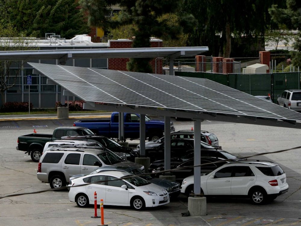 Solar panels are being installed in the parking lot of Taft High School in Woodland Hills, California, on March 27, 2012. California schools are turning to solar in hopes of saving billions state-wide on energy. (Anne Cusack/Los Angeles Times/MCT)