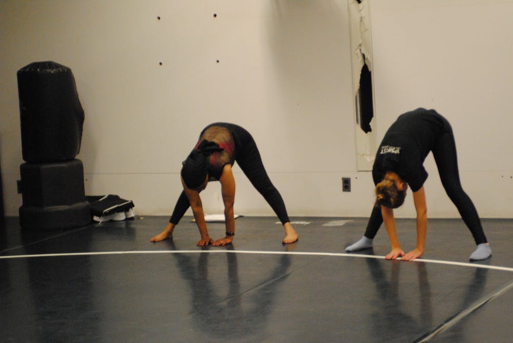 EMU adjunct instructor Holly Vogtmann teaches several PEGN classes including Yoga, which she says helps her maintain focus and clears her mind. 