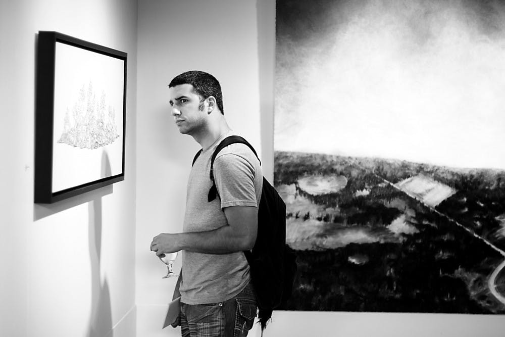 An art show was held in the University Gallery September 22. Artists were awarded and the audience was given a chance to open their eyes to art they may have otherwise walked past