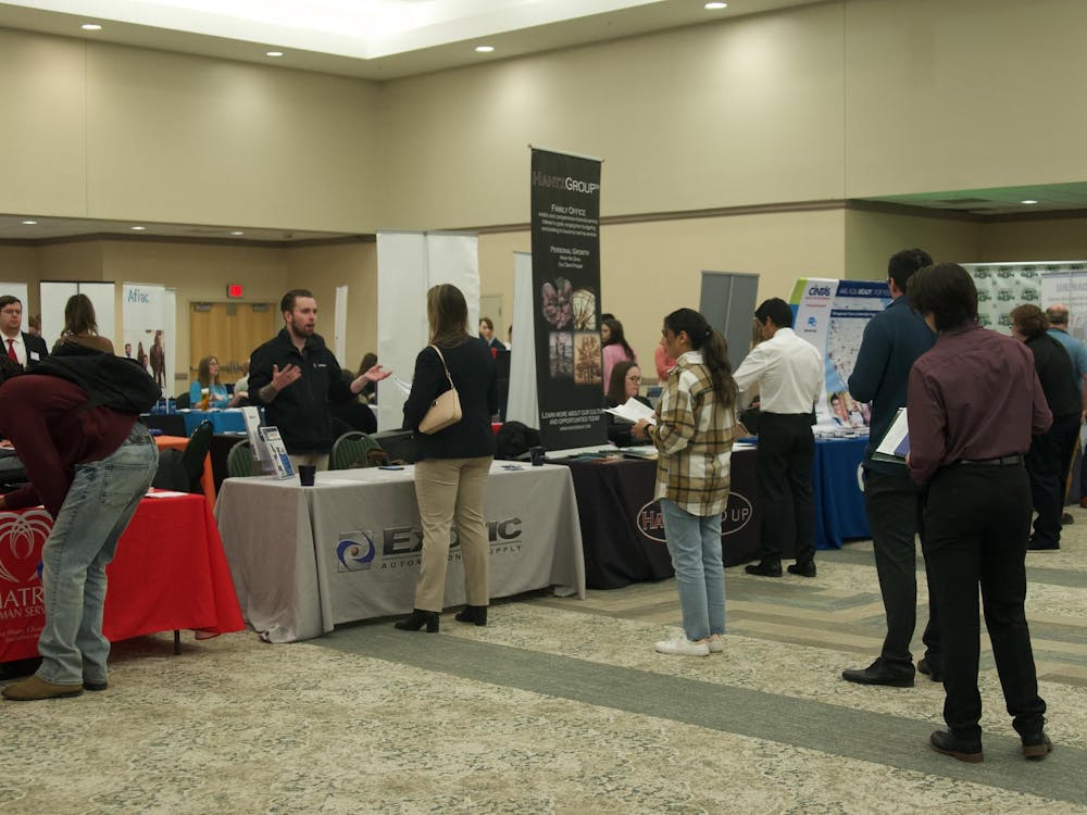 EMU's students line up at recruiters' tables at the Spring Job Fair. Photo taken March 27, 2024, at the Student Center Ballroom in Ypsilanti, MI.
