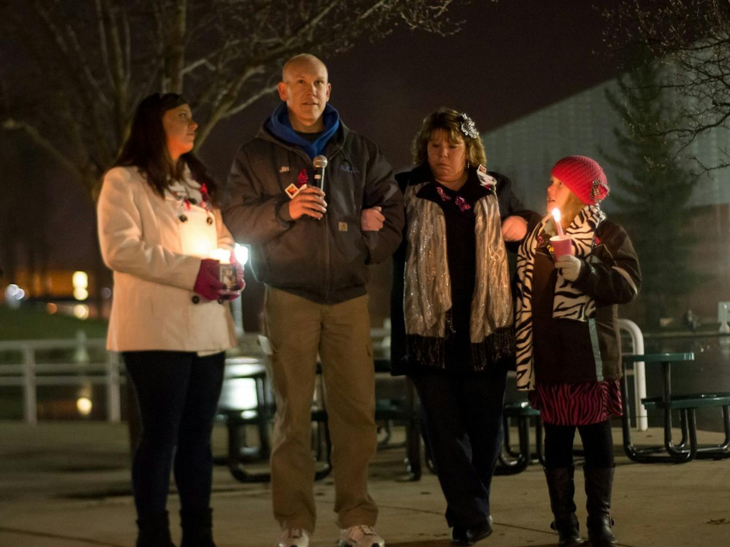 	Jim Turnquist speaks at candlelight vigil for daughter Julia.