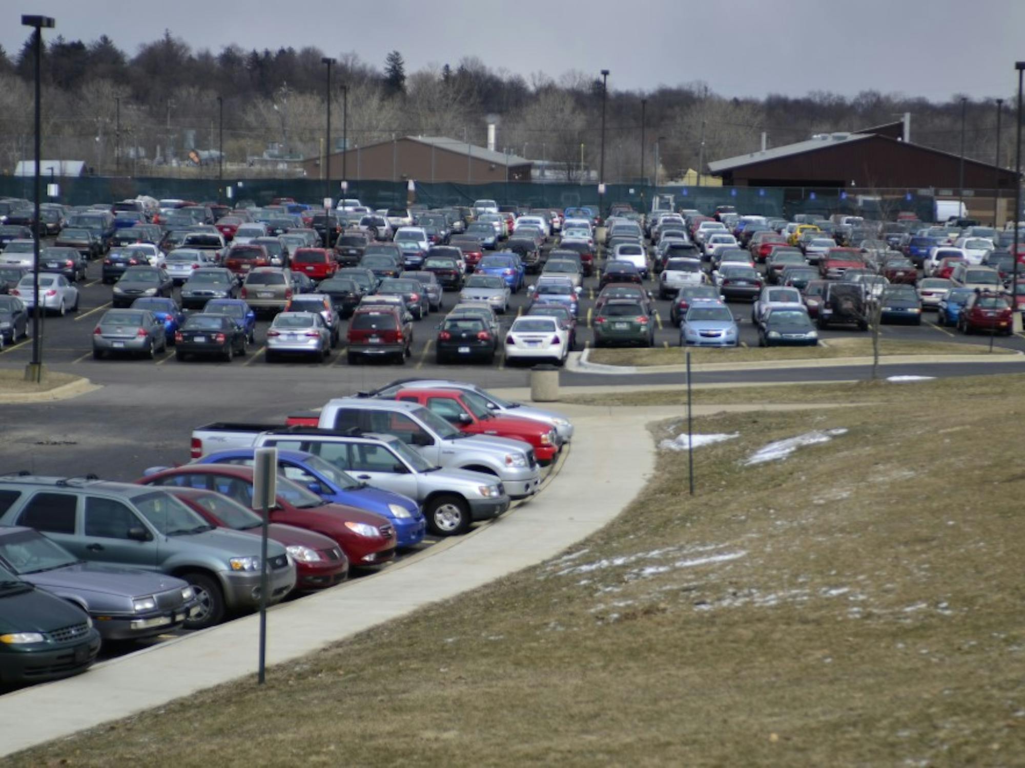 	Many EMU students who commute to campus are irritated with the lack of close spots and the potholes in some lots.