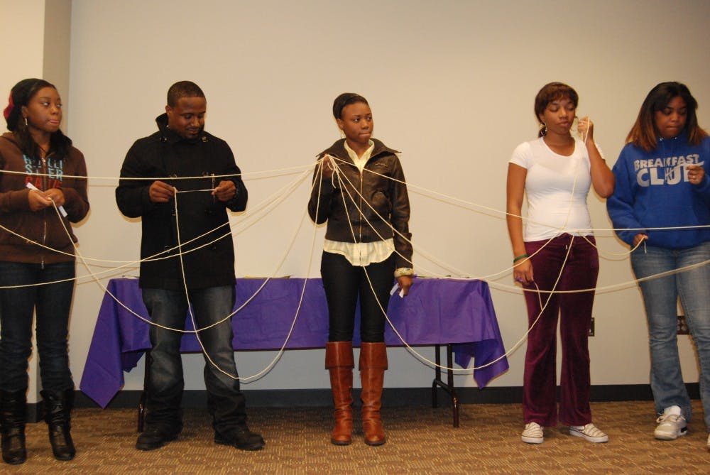 Participants in the “No Strings Attached” activity play the roles of survivor, friend, or relative to show how a survivor might feel when she or he seeks help from those she or he depends upon and is turned down. The lecture, held by the Women’s Center, focused on the fact men as well as women can be victims of domestic violence.