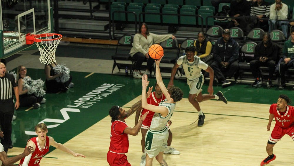 Eastern's #7 Rubio shooting with pressure from the Northern Illinois players.