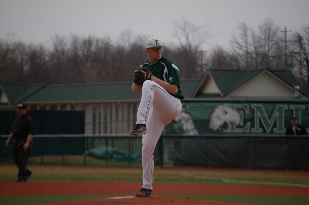 EMU starting pitcher Zane Birchler starts his windup in the first inning of the Eagles 15-9 win over Siena Heights Thurs. Apr. 10.