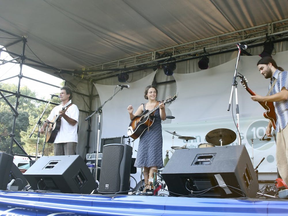 From left to right, Dick Siegel, Daisy May and Seth Bernard perform at the inaugural Ypsilanti Jamboree held last weekend at Riverfront Park.