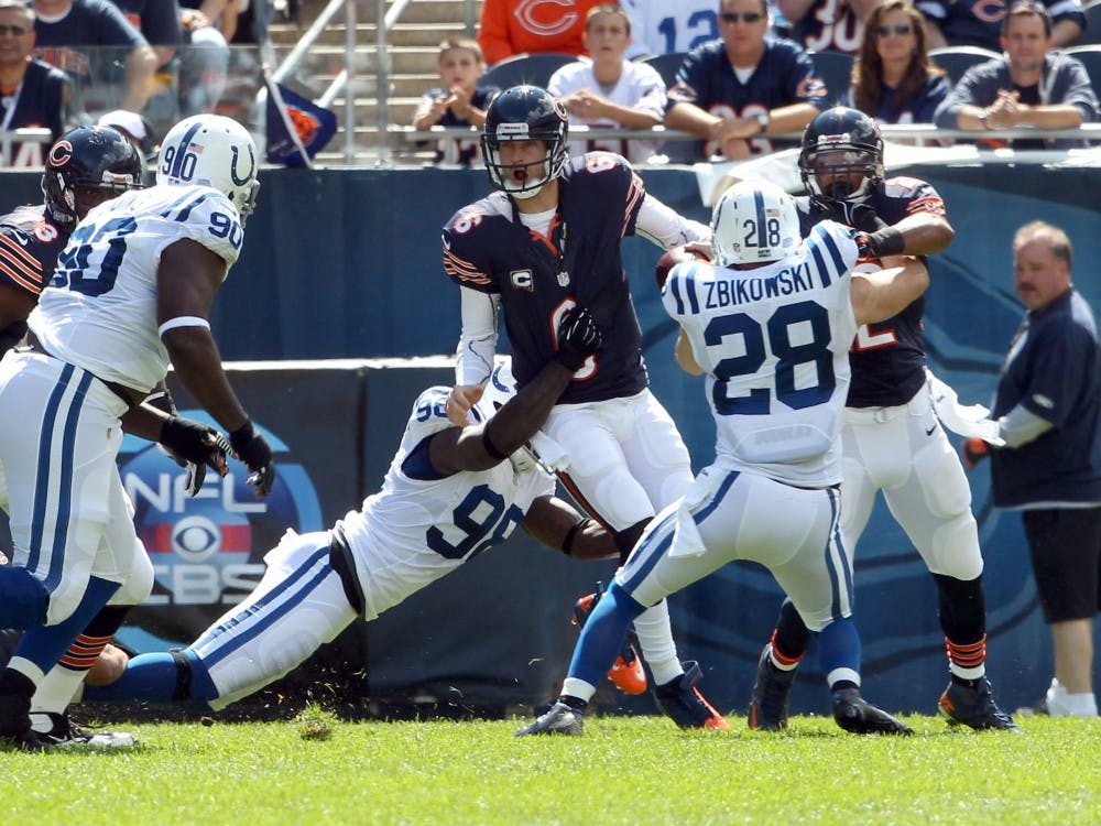 Chicago Bears quarterback Jay Cutler (6) gets sacked by Indianapolis Colts defensive end Robert Mathis (98) during the first quarter of their game at Soldier Field in Chicago, Illinois on Sunday, September 9, 2012. The Bears defeated the Colts, 41-21. (Nuccio DiNuzzo/Chicago Tribune/MCT)