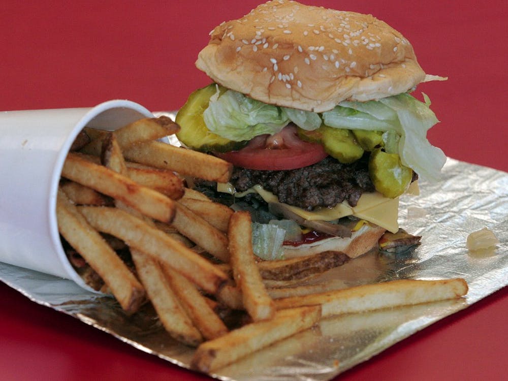 A bacon cheeseburger "all the way" is served at a Five Guys Burgers and Fries in Fremont, California. (Anda Chu/San Jose Mercury News/MCT)
