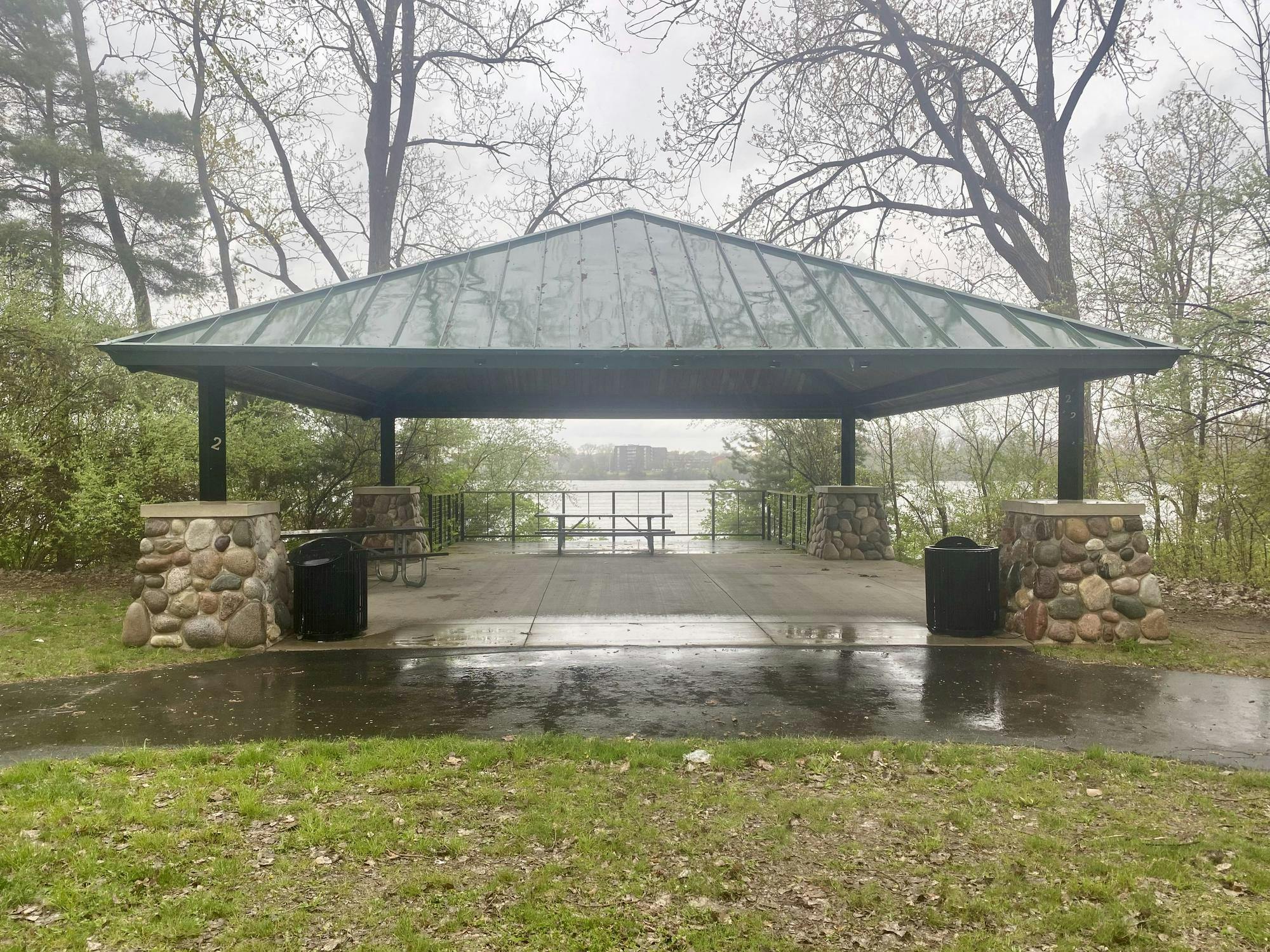 The pavilion at Lakeside Park overlooks Ford Lake, which features the home course for Eastern Michigan University's rowing team. The university and community are celebrating the installation of a new 2,000-meter rowing course on the lake that includes eight competition lanes. 