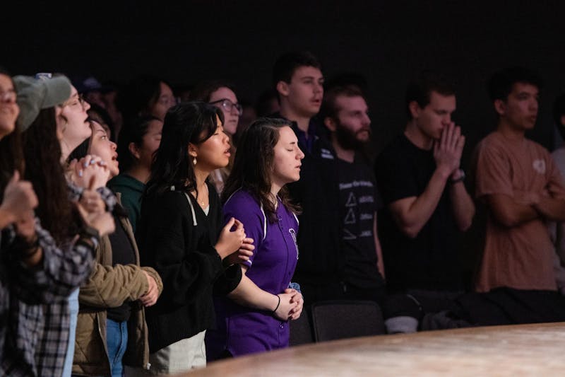 Students participate in worship to commemorate the season of Lent. Photo credit by Jamie Atherton.