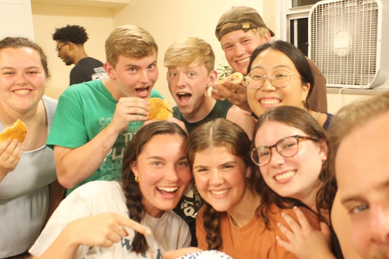 First East Olson and Second Center Wengatz enjoy pancakes on weekly bro-sis pancake night.