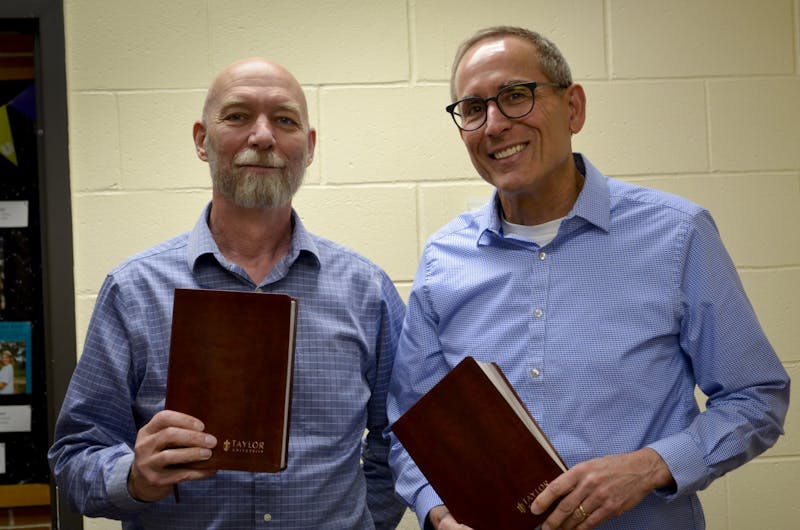 Steven Bird (left) and Philip Collins (right) were influential in bringing about Taylor's new Scripture Engagement minor. (Photo by Claire Tiemens)