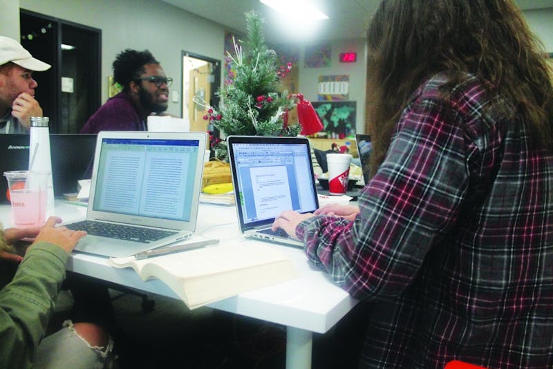 Students are armed with Chick-fil-A and laptops for their studying sessions. (Photograph by Halie Owens)
