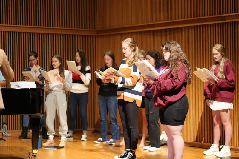 Members of Women’s Chorus gathered during one of their weekly meetings to practice singing together.
