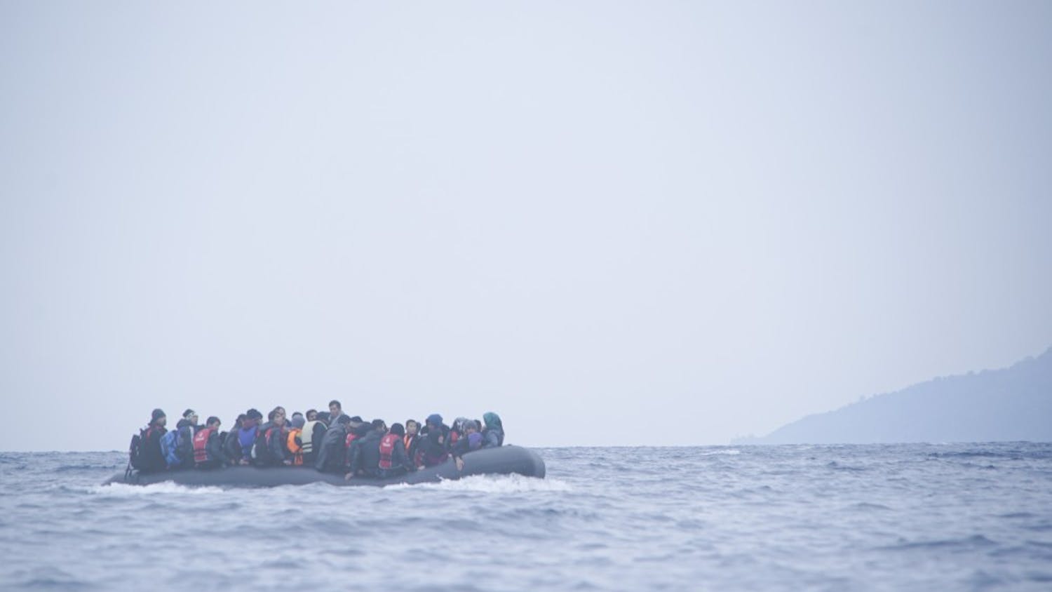 Refugees_on_a_boat_crossing_the_Mediterranean_sea_heading_from_Turkish_coast_to_the_northeastern_Greek_island_of_Lesbos_29_January_2016.jpg