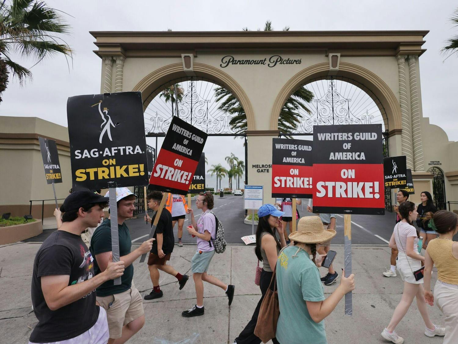 People protest wages in Hollywood. (Photo Provided by Bloomberg)