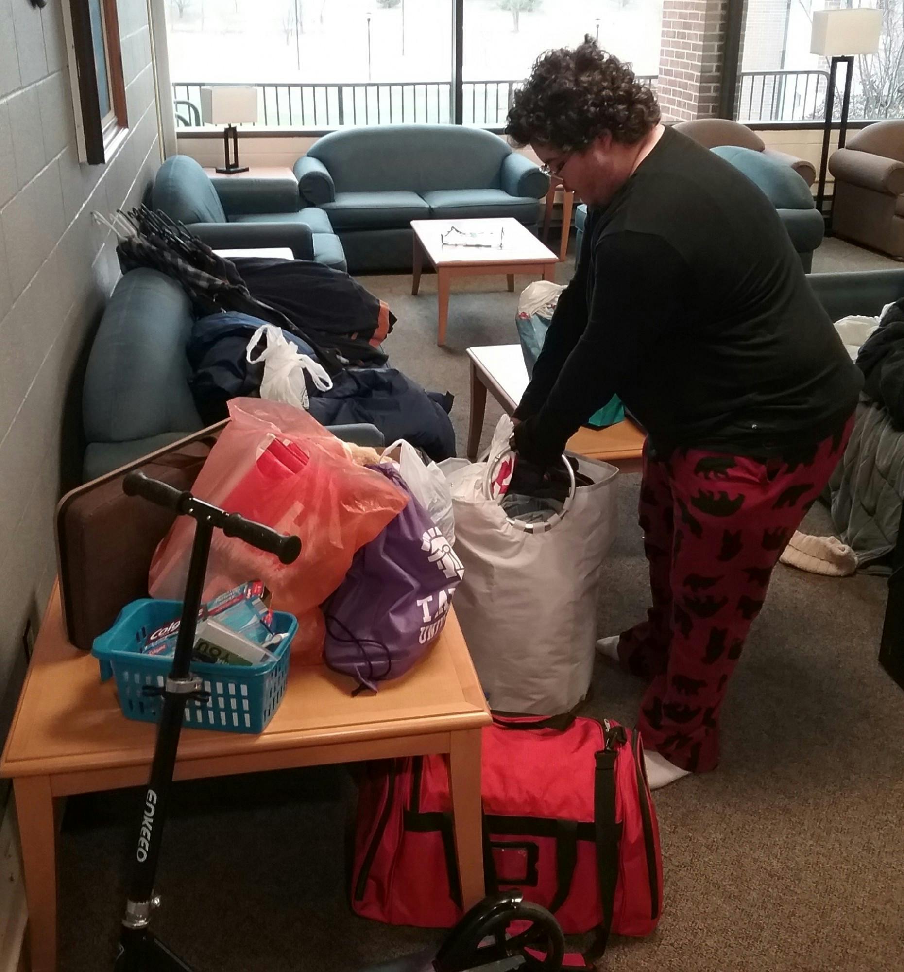 Freshman Jaxson Austin prepares to leave Gerig Hall. Photo by Matthew Phillips.jpg