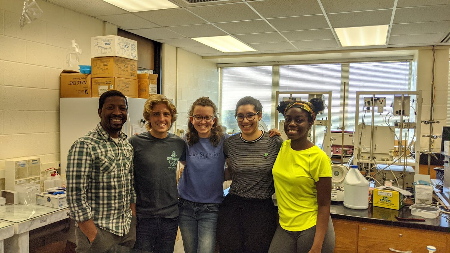 Daniel Kaluka, Alex Helmuth, Elaine Christian, Kendra Russell and Tia Watkins worked together this summer on campus.