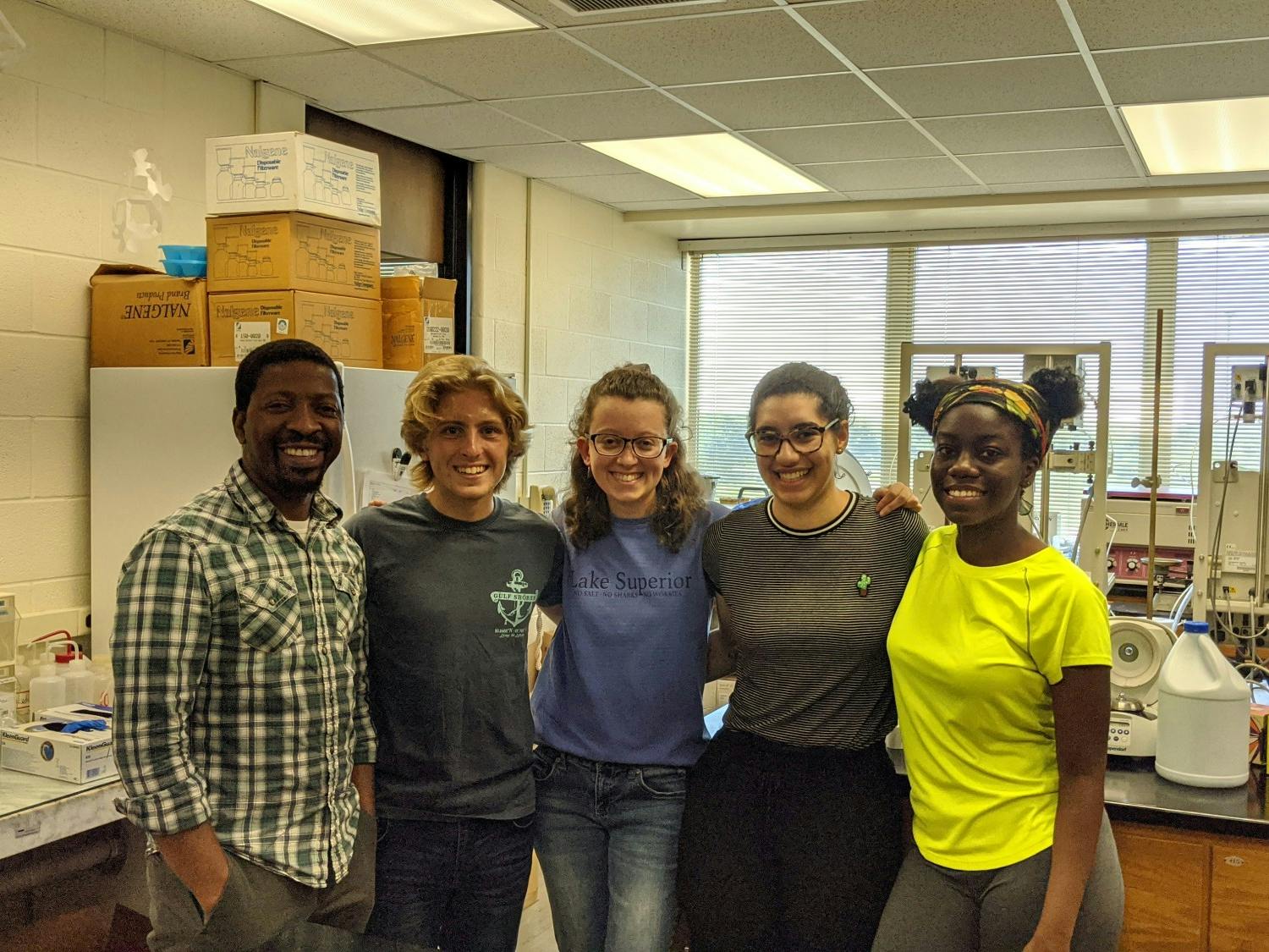 Daniel Kaluka, Alex Helmuth, Elaine Christian, Kendra Russell and Tia Watkins worked together this summer on campus.
