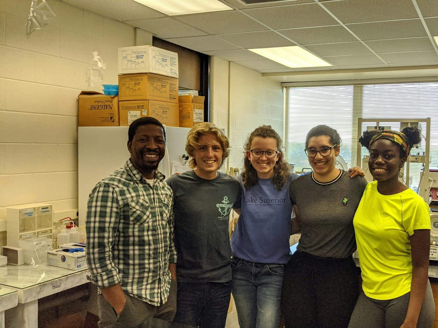 Daniel Kaluka, Alex Helmuth, Elaine Christian, Kendra Russell and Tia Watkins worked together this summer on campus.