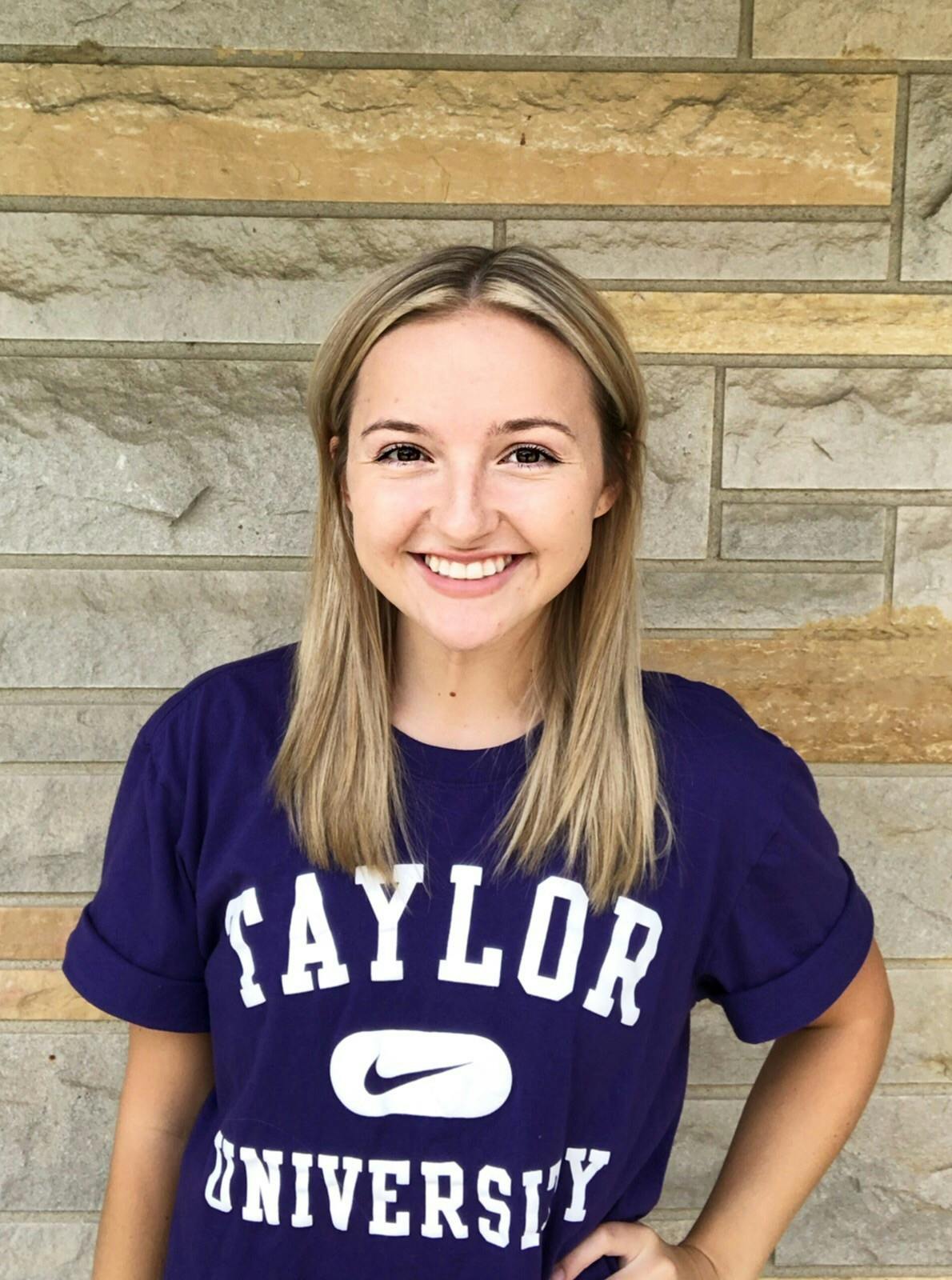 Taylor cheer has a new head coach in their transition to a varsity sport