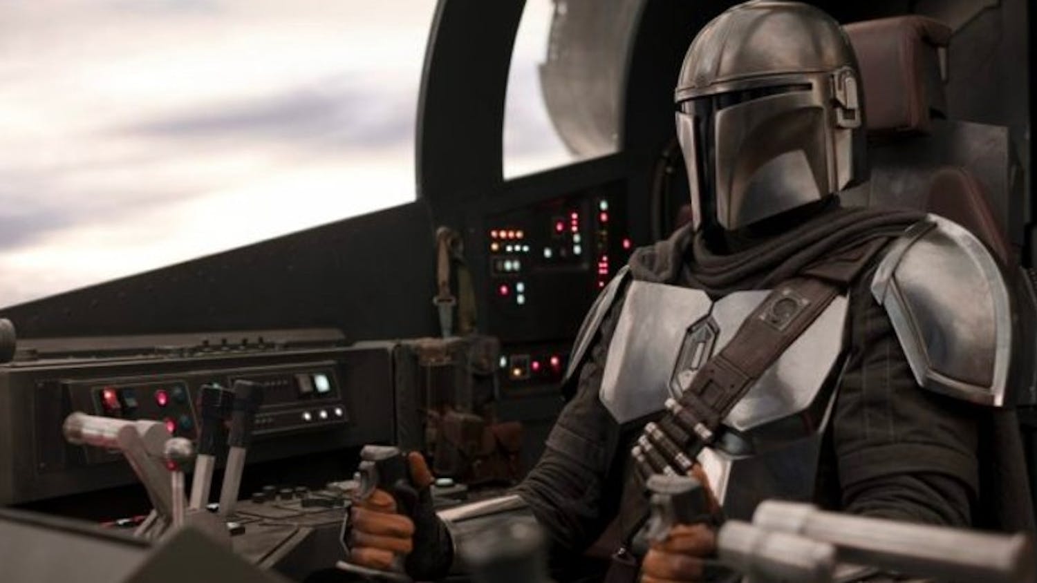 The Mandalorian, played by Pedro Pascal, pursues a mysterious cargo