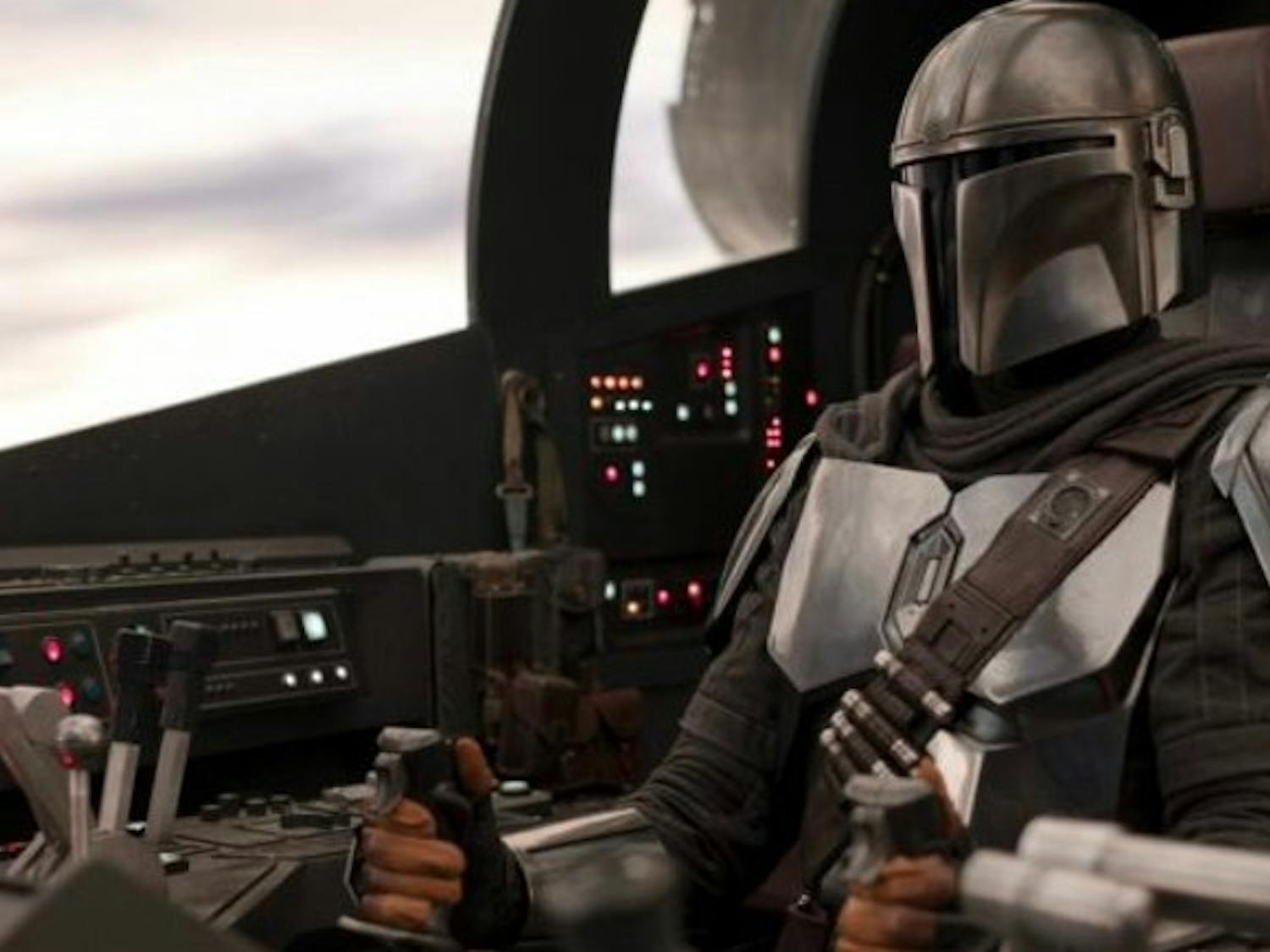 The Mandalorian, played by Pedro Pascal, pursues a mysterious cargo