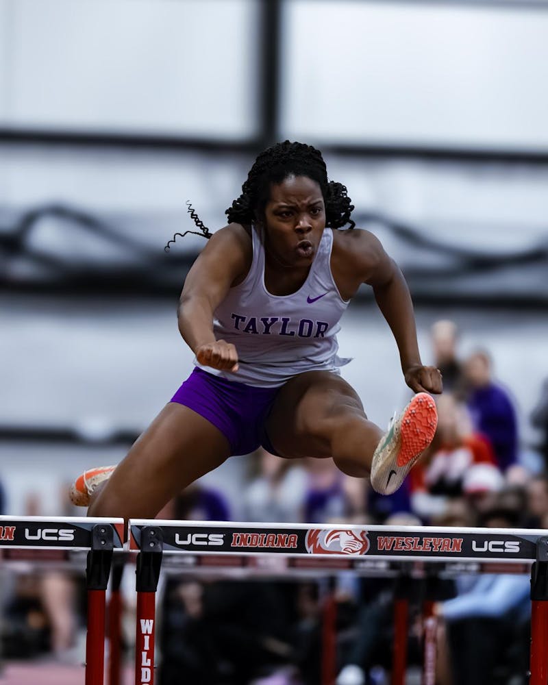 Patience Sakeuh qualified for Nationals in the 60-meter hurdles at the Trojan Invite.