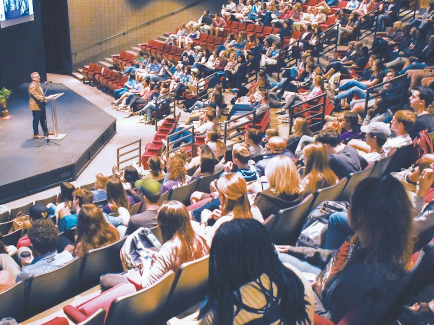 Dr. Michael Hammond looks out upon the larger-than-expected crowd in Mitchell Theatre.