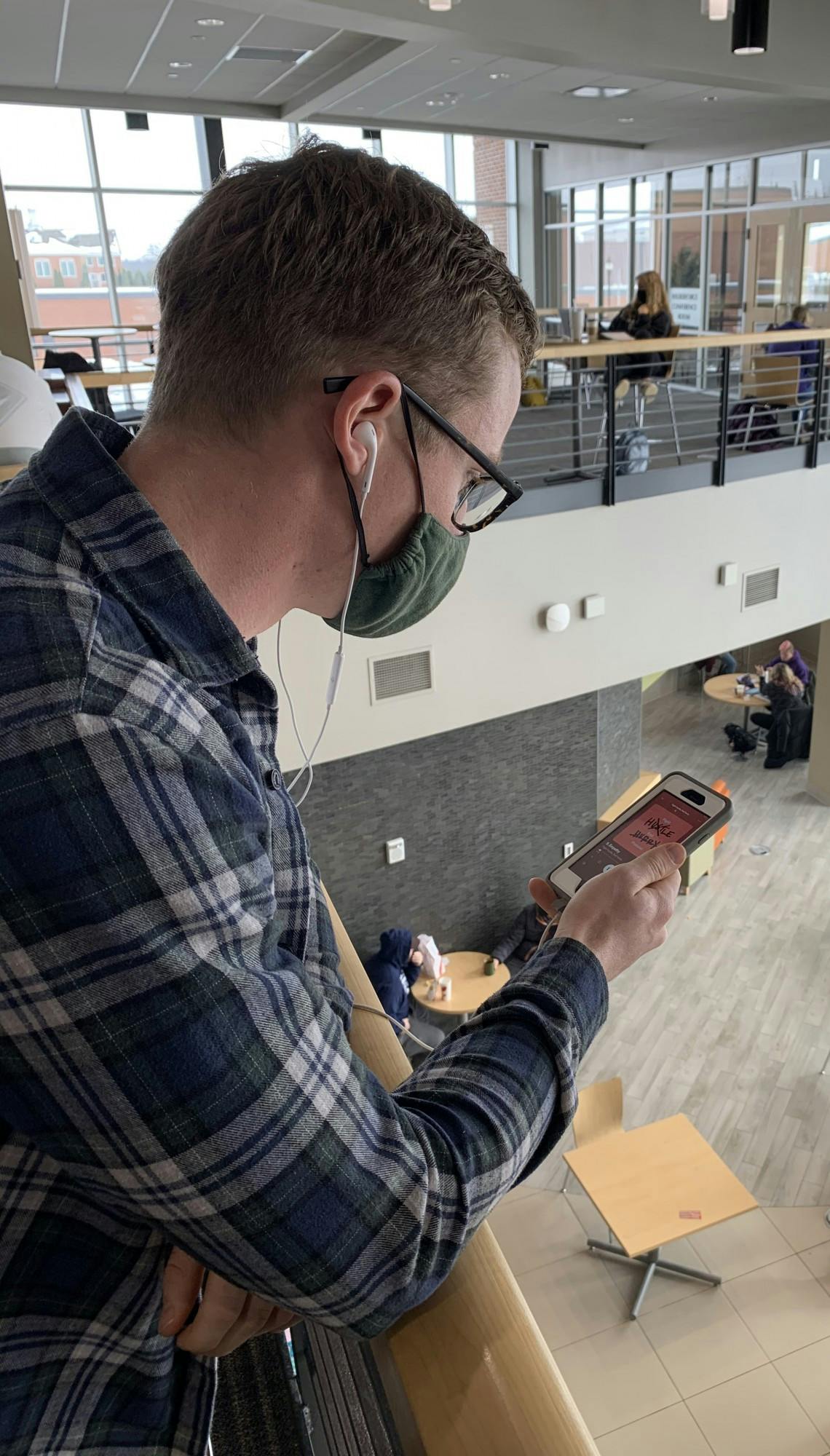 Senior Nathan Rohwer listening to a podcast.jpg